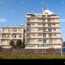 apartment-building-next-to-train-tracks-in-tokyo-japan-B4WH6B